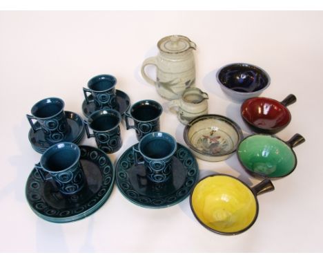 A collection of Portmeirion coffee wares designed by Susan Williams-Ellis with a dark teal glaze comprising six coffee cups, 