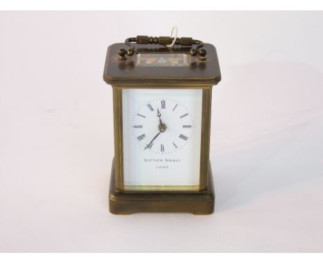A Mathew Norman carriage clock number 1754 with 11 jewel movement, 8 day timepieces