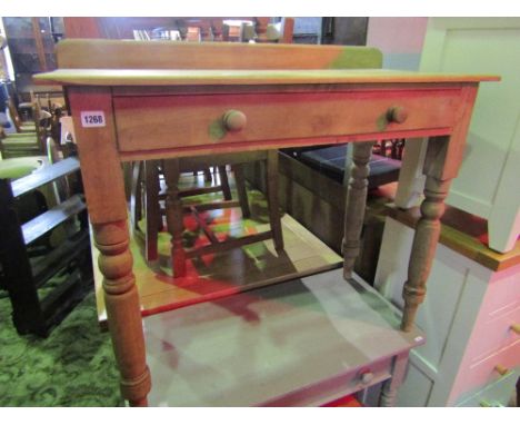 A vintage stripped pine side table fitted with a shallow frieze drawer raised on four turned supports together with one other