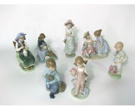 A collection of seven Nao and Lladro figure groups, all of children, including a seated girl arranging flowers, a girl with t