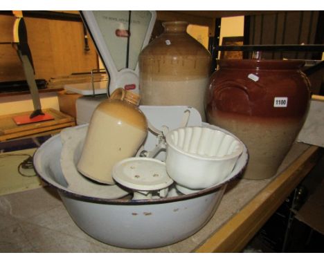 A large stoneware jar, small stoneware flagon, marble mortar, ceramic jelly mould with pineapple imprint, set of cast iron en