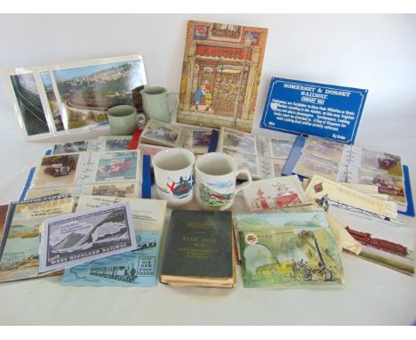 A collection of effects relating to motoring and railwayana to include a British Rail branded ceramic tea cup and milk jug, T