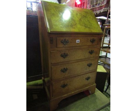A reproduction Georgian style walnut veneered ladies writing bureau with well matched figured and burr veneers, the fall flap