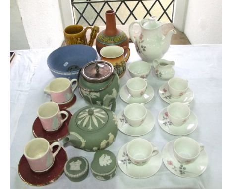A collection of Royal Doulton Pillar Rose coffee wares number TC1011 comprising a coffee pot, cream jug, sugar bowl, six cups