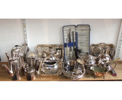 A collection of silver plated wares to include a simple three piece tea set by Walker & Hall of Sheffield to include tea pot,