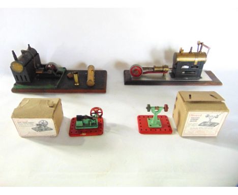 A good quality early 20th century stationary engine model, driving a single piston and wheel, with brass and painted tank and