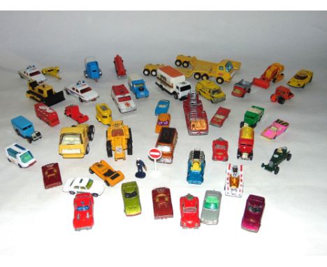 A box containing a collection of vintage die cast model vehicles to include a Corgi Land Rover and horse box, Matchbox Super 