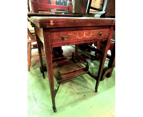 An inlaid Edwardian rosewood envelope card table with urn and scrolling acanthus detail, with fold over triangular leaves ove