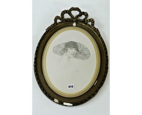 A pencil and other media shoulder length portrait of an elegant 1920's style lady in wide brimmed hat and pendant earrings, s