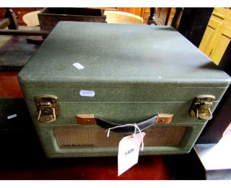 A vintage Trixette portable electric gramaphone with Garrard turntable