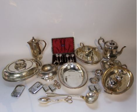 A collection of old plated wares to include various serving tureens of oval form with beaded borders, a tea pot, hot water po