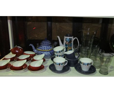 A collection of Polish tea wares all with brick red glaze and white spotted decoration comprising sugar bowl, milk jug, six c