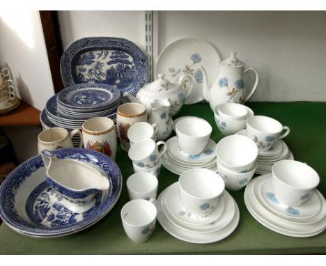 A quantity of Wedgwood Ice Rose pattern wares comprising teapot, coffee pot, milk jug, two sugar bowls, cake plate, six tea c