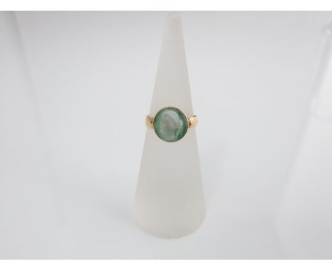 A late 19th century 18ct gold cameo set ring with classical female head detail, size K