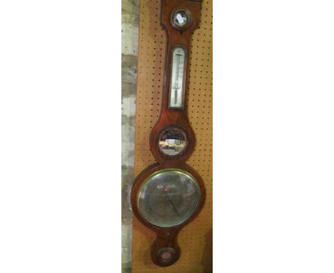 A 19th century wheel barometer with boxwood and ebony string inlay and silvered dials and further mirrored plate