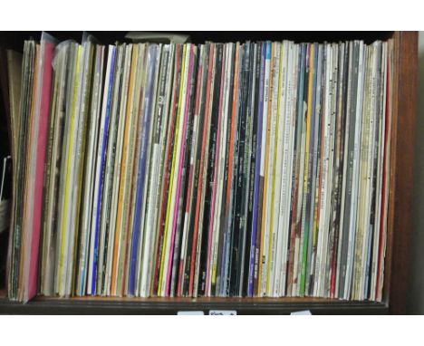 A mixed collection of mainly contemporary LP's artist including The Beatles (Revolver) Bob Dylan, The Kinks, Bruce Springstee