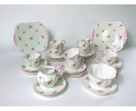 A collection of Shelley Bridal Rose pattern tea wares number 13545 comprising a pair of cake plates, a milk jug, sugar bowl, 