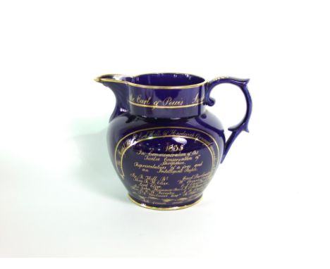 A 19th century dark blue ground jug with gilt inscription dated 1835 commemorating the Twelve Conservatives of Shropshire wit