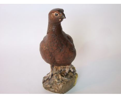 A Royal Doulton matt glazed whisky flask in the form of a red grouse, produced for Matthew Gloag & Son Limited