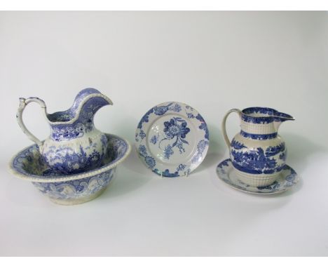 A pair of 19th century tin glazed earthenware plates with blue and white painted floral decoration in the chinoiserie manner,