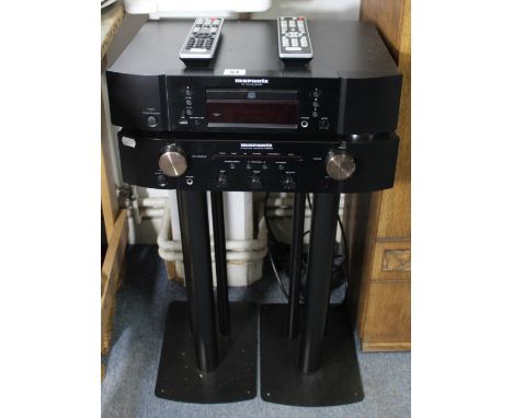 A Marantz cd player (CD6003); &amp; a ditto Integrated Amplifier (FM6003), each with a remote control; &amp; a pair of speake