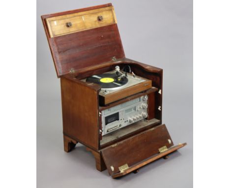 A 19th century mahogany small chest commode (containing a matched hi/fi system) enclosed by a hinged lift-lid &amp; fall-fron