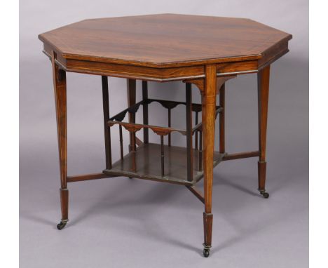 A Victorian rosewood octagonal centre table, the figured top with boxwood inlay &amp; moulded edge, the undertier with square