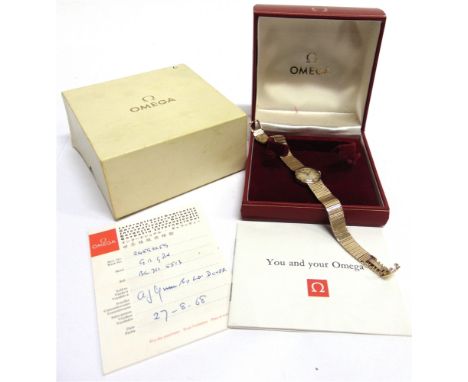 OMEGA, A LADY'S 9CT GOLD BRACELET WATCH  ref BL7115513, circa 1966-67, the round brushed gilt dial with raised baton numerals