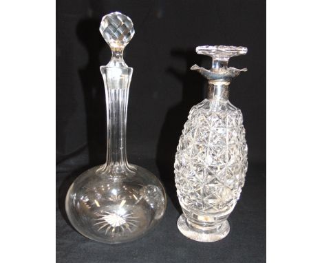 A SILVER MOUNTED CLEAR CUT GLASS DECANTER &amp; STOPPER the triform mount, Sheffield 19?? by William Hutton &amp; Sons, Ltd; 