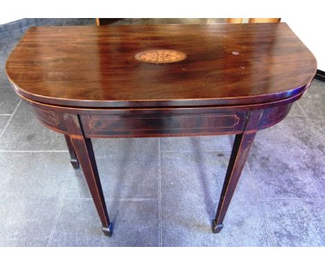 A MAHOGANY CARD TABLE  with marquetry inlaid decoration, on square tapering supports with spade feet, 92cm wide