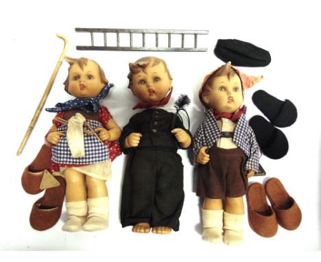 THREE HUMMEL RUBBER COMPOSITION DOLLS  two ('Felix' and 'Liesl') with original triangular wooden swing tags, each approximate