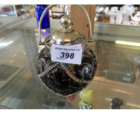 A 19th Century Doulton Lambeth preserve jar and cover with silver-plated cover, swing handle and rim, having incised and reli