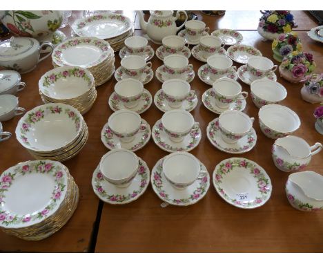 An extensive Colclough rose pattern tea and dinner service, comprising dinner side plates, dessert bowls, cups, saucers and s