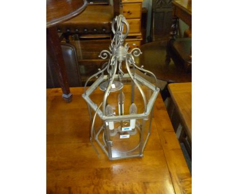 A reproduction period-style gilt metal ceiling light, the hexagonal form with glass panels (one panel missing - sold electric
