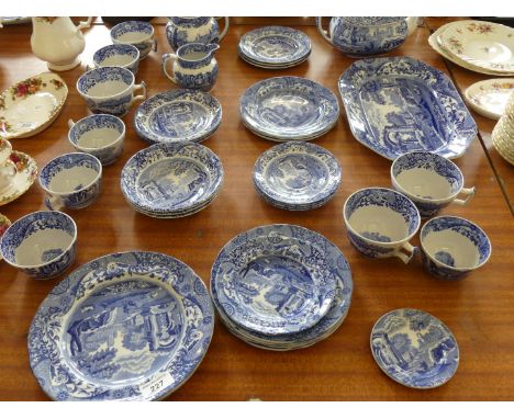 A quantity of Spode blue and white table wares to include an Italian pattern teapot, meat platter, cups, saucers, assorted pl