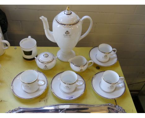 A Wedgwood Cavendish Queen Elizabeth II World Cruise commemorative coffee set, comprising coffee pot, sugar basin, milk jug a