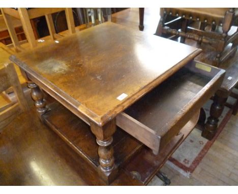 A fine quality reproduction oak square topped coffee table, with single drawer and shelf beneath by Titchmarsh & Goodwin.