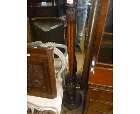 A stained carved hardwood standard lamp (sold electrically untested).