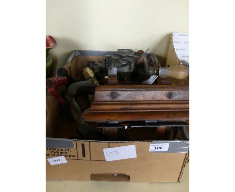 A collection of woodworking tools and effects, to include a brass mounted brace, vintage universal mincer, three plough plane