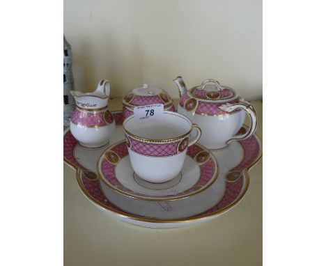 A Porcelain tea service for one, comprising trefoil tray, cup and saucer, milk jug, sugar basin and teapot.   CONDITION REPOR