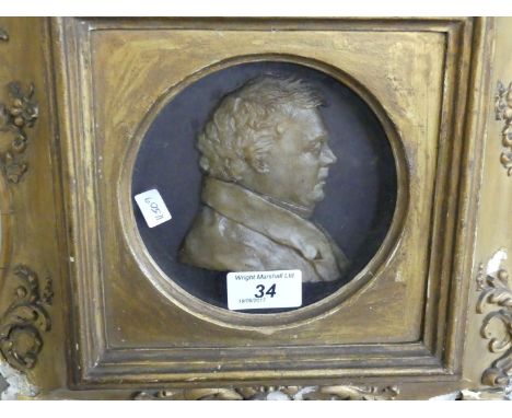 A 19th Century gilt framed portrait panel.