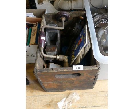 A box of woodworking tools and advertising tiles, to include a drill brace, planes, brasso, wall tiles.