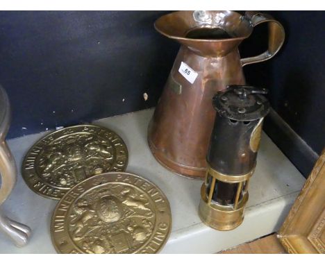 A 19th Century copper haystack measure, a brass cased Hallwoods miners lamp and two brass circular safe plaques.