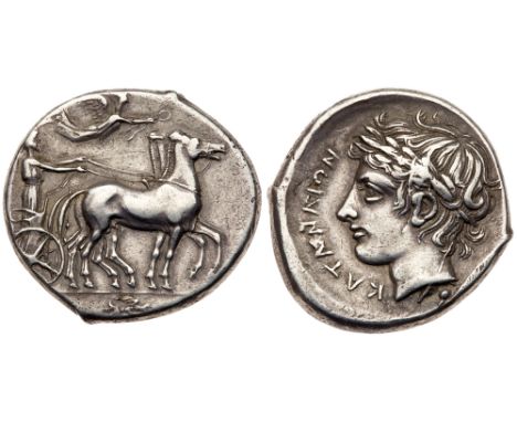 Sicily, Katane, Silver Tetradrachm (17.18 g, 2h). 415-410 BC. Dies engraved by the "Master of the leaf". Charioteer, wearing 
