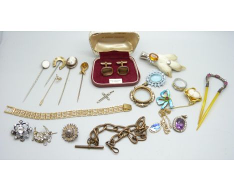 A collection of costume jewellery, stick pins, an Albert chain, etc. 