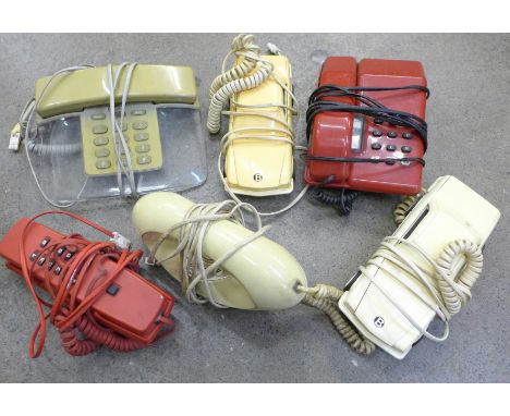 A collection of vintage telephones including two car shaped and BT Genie 
