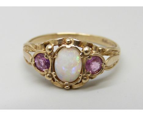 A 9ct gold opal and amethyst ring, 2.9g, S 
