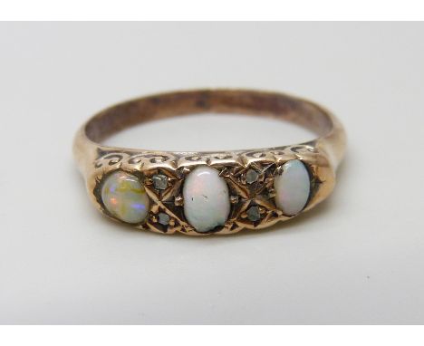 An Edwardian 9ct gold opal and diamond ring, Birmingham 1908, 1.4g, P 