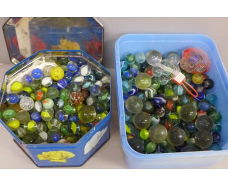 Two tubs of vintage marbles including early 20th Century 