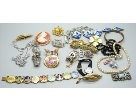 A collection of vintage jewellery including marcasite and named brooches 